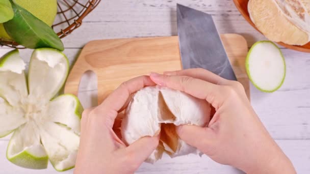 Young Asian Woman Peeling Fresh Pomelo Eat Home Kitchen Bright — Stock Video