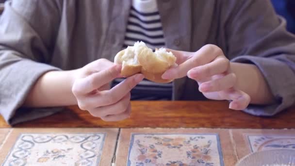 Woman Cropped View Breaking Tearing Delicious Bun Bread Hand Pieces — Stock Video