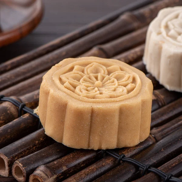 Colorful beautiful moon cake, mung bean cake, Champion Scholar Pastry cake for Mid-Autumn festival traditional gourmet dessert snack, close up.