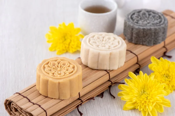 Colorful beautiful moon cake, mung bean cake, Champion Scholar Pastry cake for Mid-Autumn festival traditional gourmet dessert snack, close up.