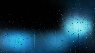 Siyah ve mavi su arka planda düşer