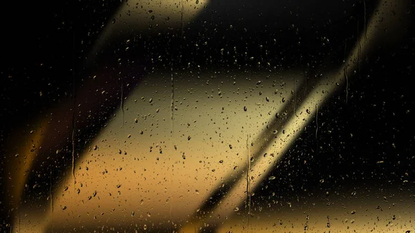Капли воды на холодном золотом фоне — стоковое фото