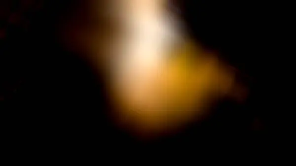 Schwarze Flamme gelb Hintergrund — Stockfoto