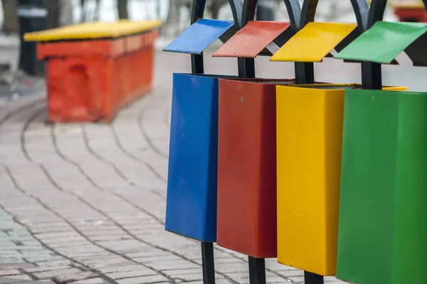 Four Multi Colored Garbage Bins Separate Waste Collection Stand Row — Stock Photo, Image