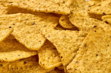Sarı üçgen Mısır nachos yakın-up arka plan