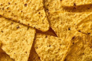 Sarı üçgen Mısır nachos yakın-up arka plan