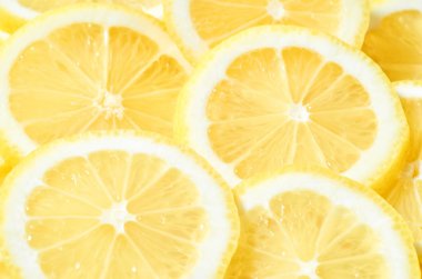 yığın taze sarı limon dilimleri arka plan. tasarımınız için desen