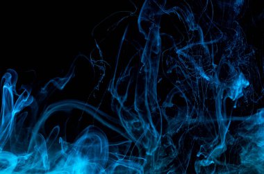 Sudaki akrilik renkler. Mürekkep lekesi. Soyut arkaplan.