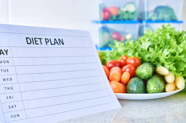 A meal plan for a week on a white table among set of plastic containers for food and food. Proper nutrition during the week.
