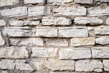 Farklı taşlardan oluşan eski taş duvar, tasarımınız için doku.