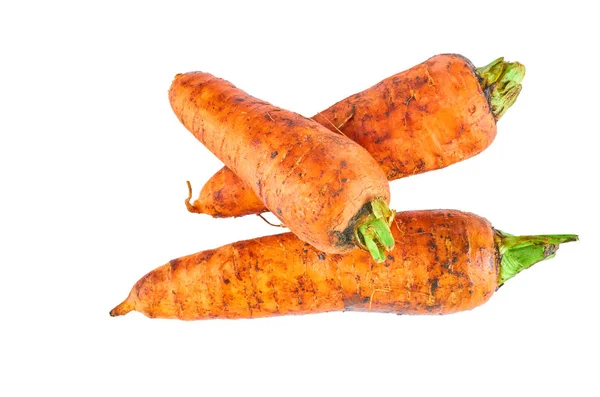 Tres zanahorias frescas aisladas sobre fondo blanco. La vista desde arriba. Fondo alimentario ecológico . —  Fotos de Stock