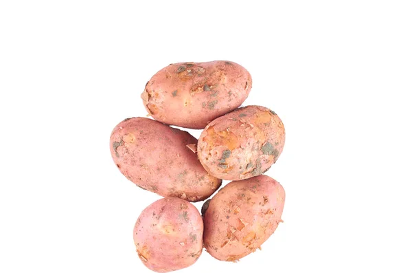 Verse rode aardappelen geïsoleerd op witte achtergrond. Het uitzicht vanaf de top. Biologische voedsel achtergrond. — Stockfoto