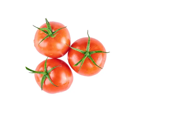 Tomates frescos aislados sobre fondo blanco. La vista desde arriba. Antecedentes de los alimentos ecológicos . —  Fotos de Stock