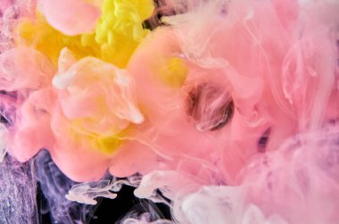 Suda çok renkli akrilik mürekkep. Soyut arka plan.