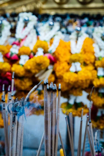 Incense sticks in buddhist temple in Bangkok, worship