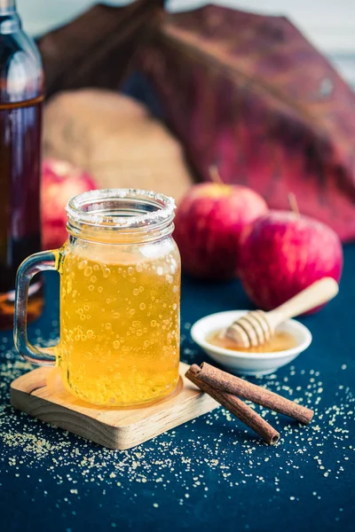 Glass of healthy bael tea with cinnamon, appel and honey — Stock Photo, Image