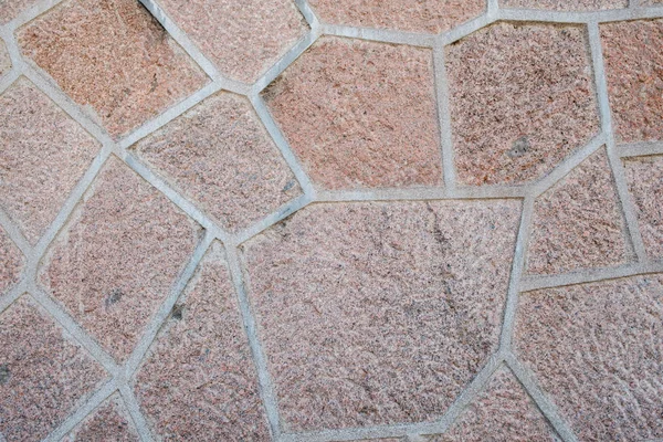 Υφή γραφικών πόρων κόκκινο πέτρα δεν γεωμετρικό μοτίβο τοίχο πάτωμα κοντά — Φωτογραφία Αρχείου