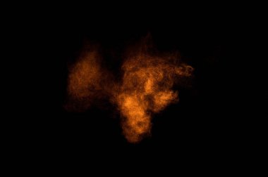 Siyah arka plan üzerine Portakal tozu patlama. Renkli toz bulutu. Renkli toz patlayabilir. Boya Holi.