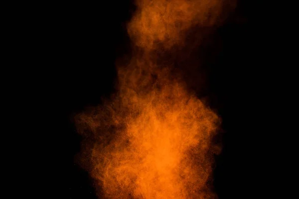 Orange Pulver Explosion Svart Bakgrund Färgat Pulver Moln Färgglad Damm — Stockfoto