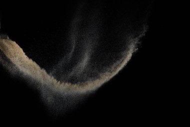 Siyah arka plan üzerine izole Sandy patlama. Soyut parçacıklar bulut. Doku eleman tasarımı için.