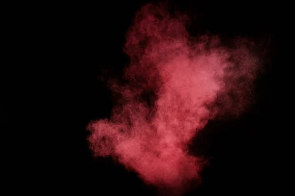 黒い背景に赤とピンクの粉の爆発 色粉の雲 カラフルなダストが爆発します ペイント ホーリー — ストック写真