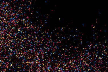 Renkli patlama konfeti. Siyah arka plan üzerine izole grenli soyut çok renkli doku. Düz tasarım öğesi. Vektör çizim, eps 10.