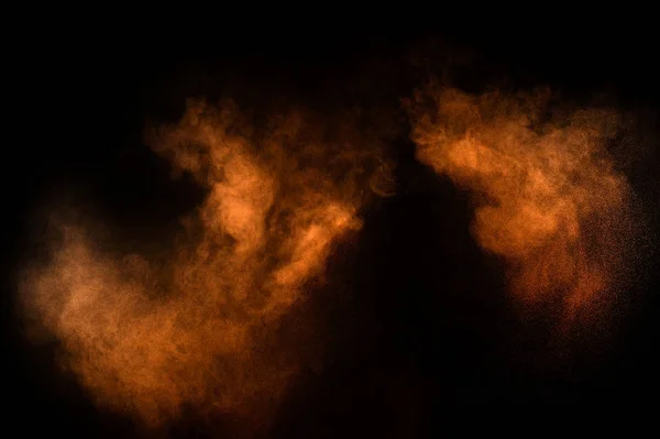 Explosion Orangefarbenen Pulvers Auf Schwarzem Hintergrund Farbige Puderwolke Bunter Staub — Stockfoto
