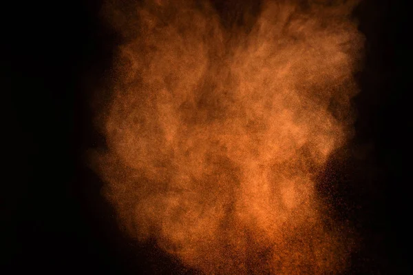 Oranje Poeder Explosie Zwarte Achtergrond Gekleurde Poeder Wolk Kleurrijke Stof — Stockfoto