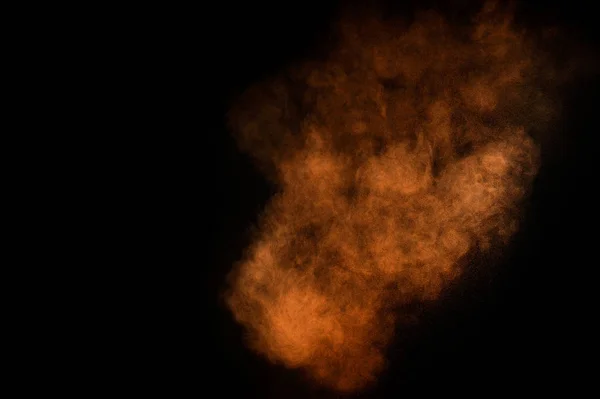 Oranje Poeder Explosie Zwarte Achtergrond Gekleurde Poeder Wolk Kleurrijke Stof — Stockfoto