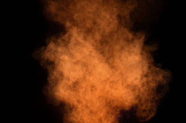 Orange Pulver Explosion Svart Bakgrund Färgat Pulver Moln Färgglad Damm — Stockfoto