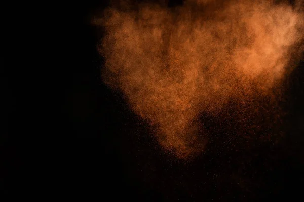 Oranžový Prášek Exploze Černém Pozadí Barevný Prášek Mrak Barevný Prach — Stock fotografie