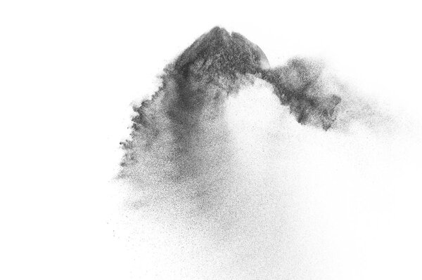 Взрыв черных частиц изолирован на белом фоне. Абстрактная пылевая текстура.