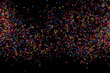 Renkli patlama konfeti. Siyah arka plan üzerine izole grenli soyut çok renkli doku. Raster ve bit eşlem kopya sürüm.