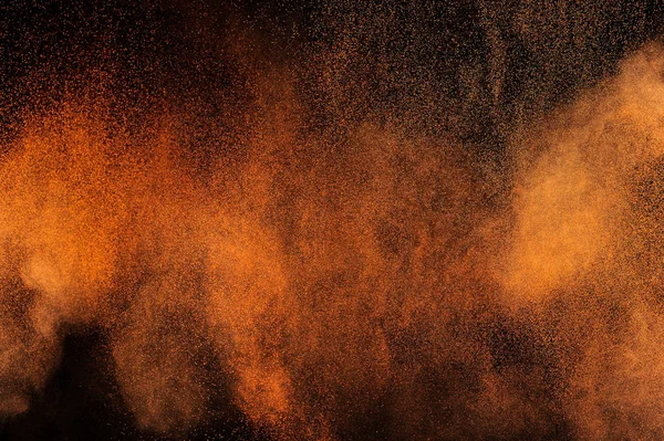 Explosion Orangefarbenen Pulvers Auf Schwarzem Hintergrund Flammenwolke Gelber Staub Explodiert — Stockfoto