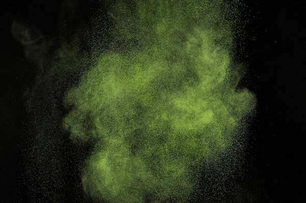 Взрыв светло-зеленого порошка на черном фоне. Цитронное облако. Лимонная пыль взрывается. Холи-чан
.