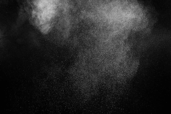 白色颗粒在黑色背景上的冻结运动 粉末爆炸 灰尘覆盖纹理 — 图库照片