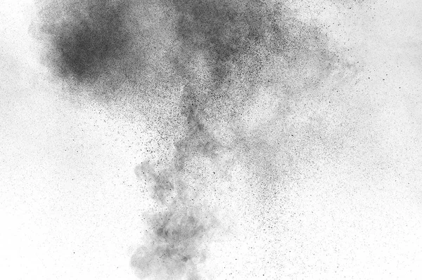 Black particles explosion isolated on white background.  Abstract dust overlay texture.