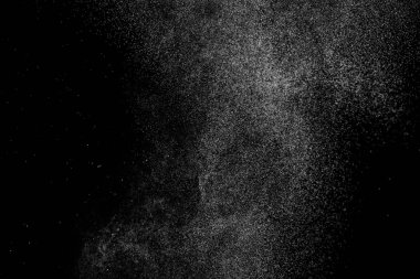 Siyah arkaplanda soyut su sıçramaları.