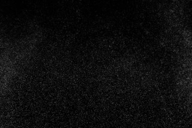 Siyah arkaplanda soyut su sıçramaları.