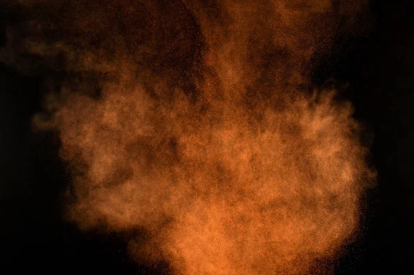 Orange powder explosion. — Stock Photo, Image