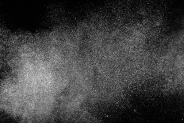 Movimento di congelamento di particelle bianche su sfondo nero . — Foto Stock