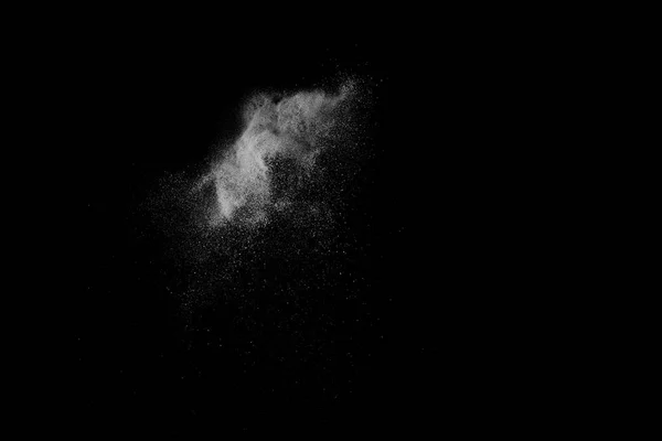 Fagyassza be mozgás a fekete háttér fehér részecskék. — Stock Fotó