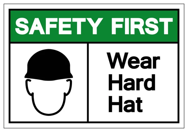 Bezpieczeństwo pierwszy nosić twardy kapelusz symbol znak, wektor ilustracji, wyizolować na białym tle Label. Eps10 — Wektor stockowy