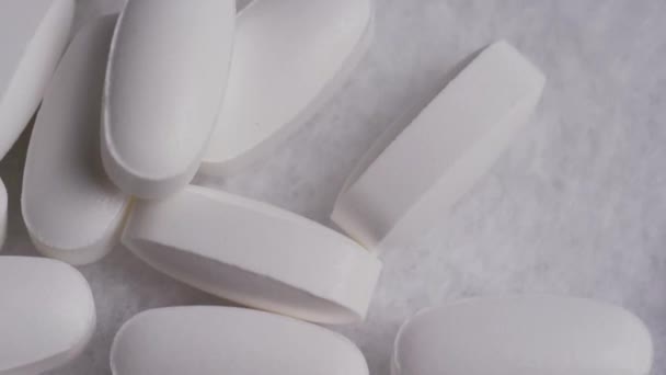 Imágenes rotativas de vitaminas y píldoras — Vídeo de stock