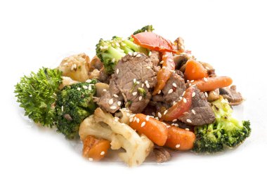 Veal, fried in WOK with vegetables in soy sauce. Asian Lunch