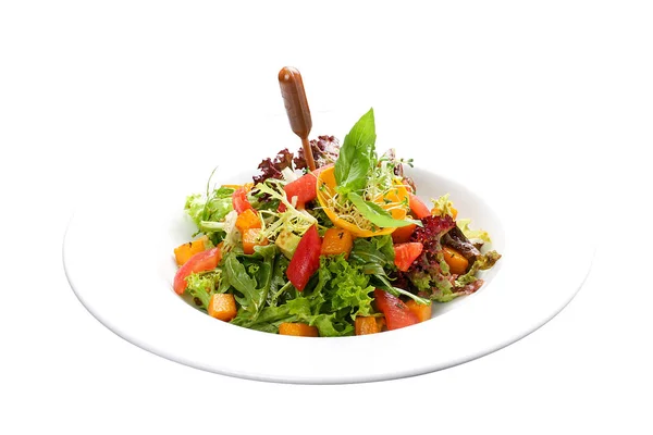 Salade de citrouilles et avocat sur fond blanc — Photo