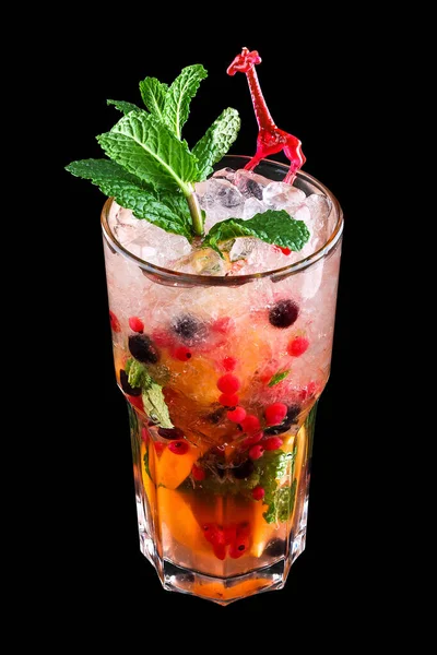 Lemonade with wild berries in a glass on a dark background. Drink for children. — Stock Photo, Image
