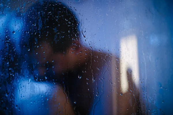 Man and woman naked together in the shower