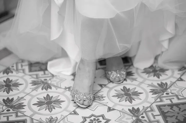 Wedding festive shoes of the bride close up on the wedding day