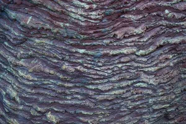 Details of Japanese Zen Garden. Surface of natural uneven volcanic Purple slate stone. Purple slate is the ideal material for standing stone groupings in Japanese gardens.